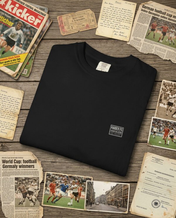 magnific_museumquality-flat-lay-ph_wPQZxcx7EI The Tournament Ends, The Memory Doesn't T-Shirt | Germany 1990 Archive Tee | Football Culture Shirt | Kaiser FC Archive No. 011