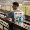 magnific_ultrarealistic-football-c_hEY1JYUvqL It Still Feels Like Summer T-Shirt | Argentina 1986 Archive Tee | Vintage World Cup Shirt | Football Culture T-Shirt | Kaiser FC Archive No. 010C