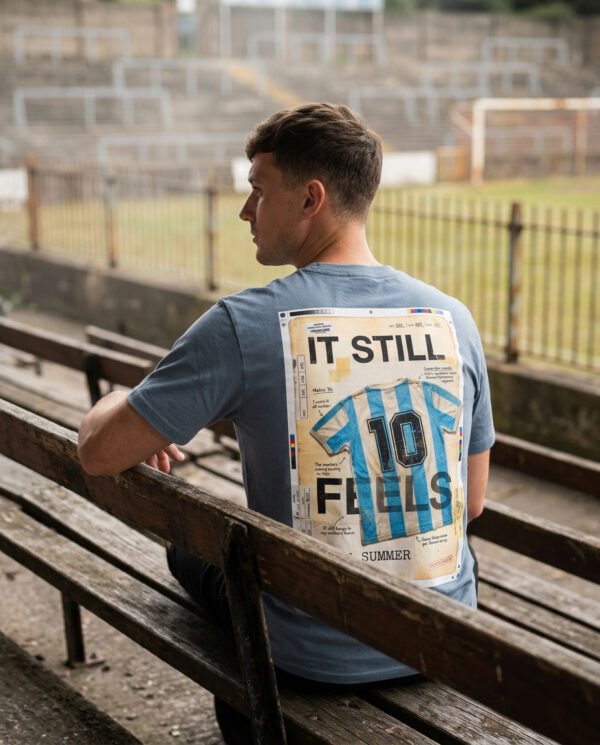 magnific_ultrarealistic-football-c_hEY1JYUvqL It Still Feels Like Summer T-Shirt | Argentina 1986 Archive Tee | Vintage World Cup Shirt | Football Culture T-Shirt | Kaiser FC Archive No. 010C